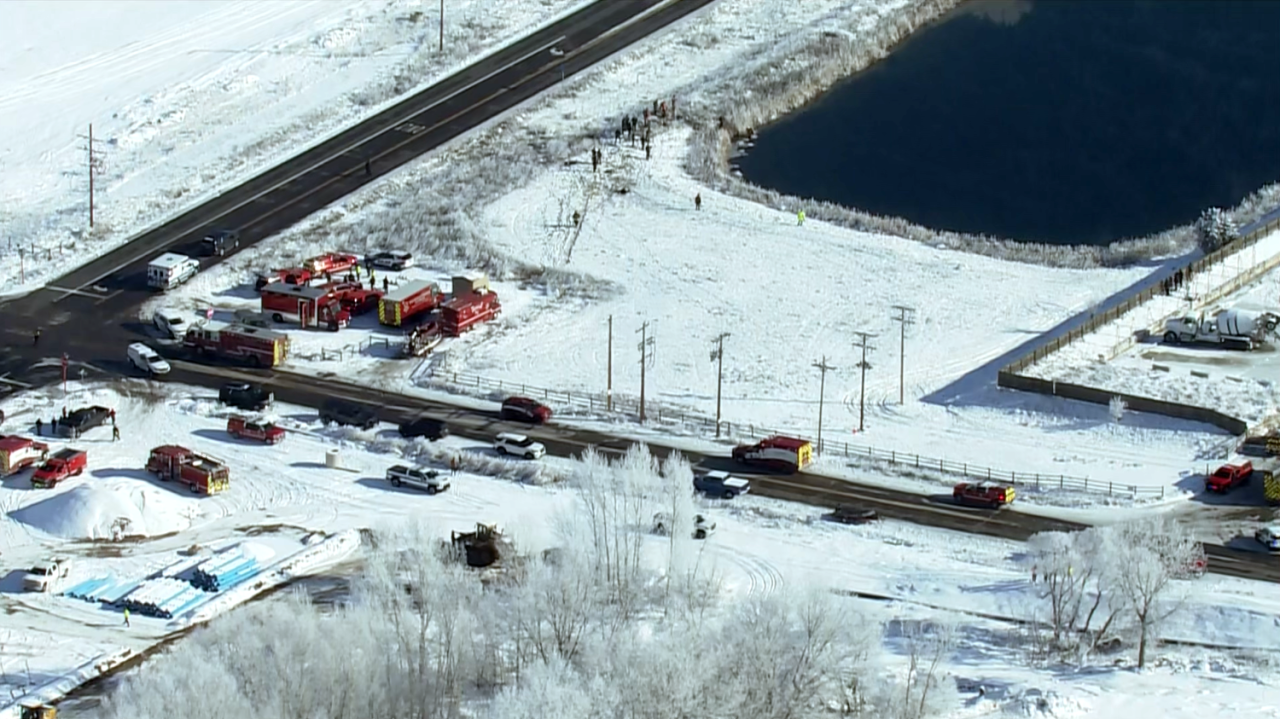 Search for possible car at pond in Weld County (no car in water)