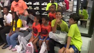 Palm Beach County students receive back to school shoes from singer Mark Morrison.jpg