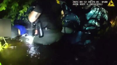 Deputies in Martin County are being hailed for their heroic rescue of two people whose vehicle crashed into a water-filled embankment on Sept. 12, 2025.