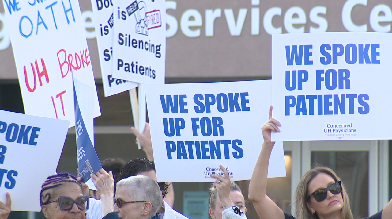 Hundreds of people gather outside of University Hospitals Management Services Center on Friday, July 11 in support of recently fired pediatricians, Dr. Lauren Beene and Dr. Valerie Fouts-Fowler. News 5 Cleveland photo.