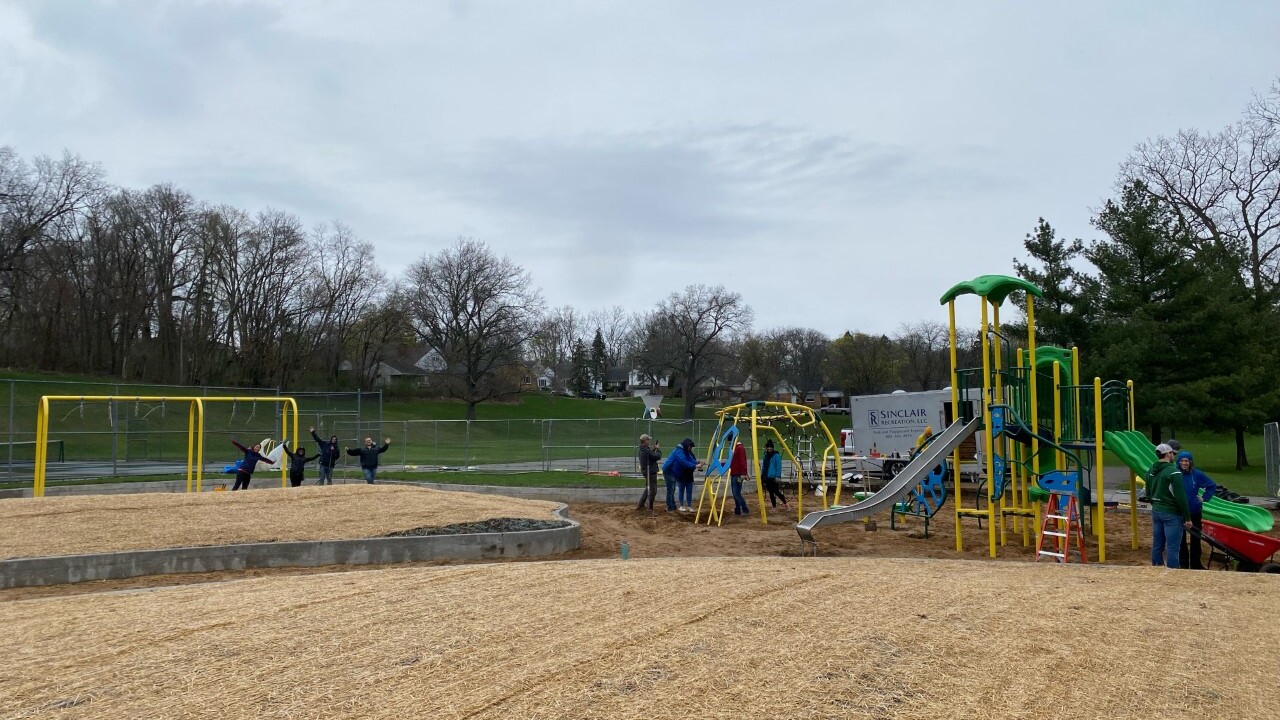 Volunteers build new playground in Grand Rapids