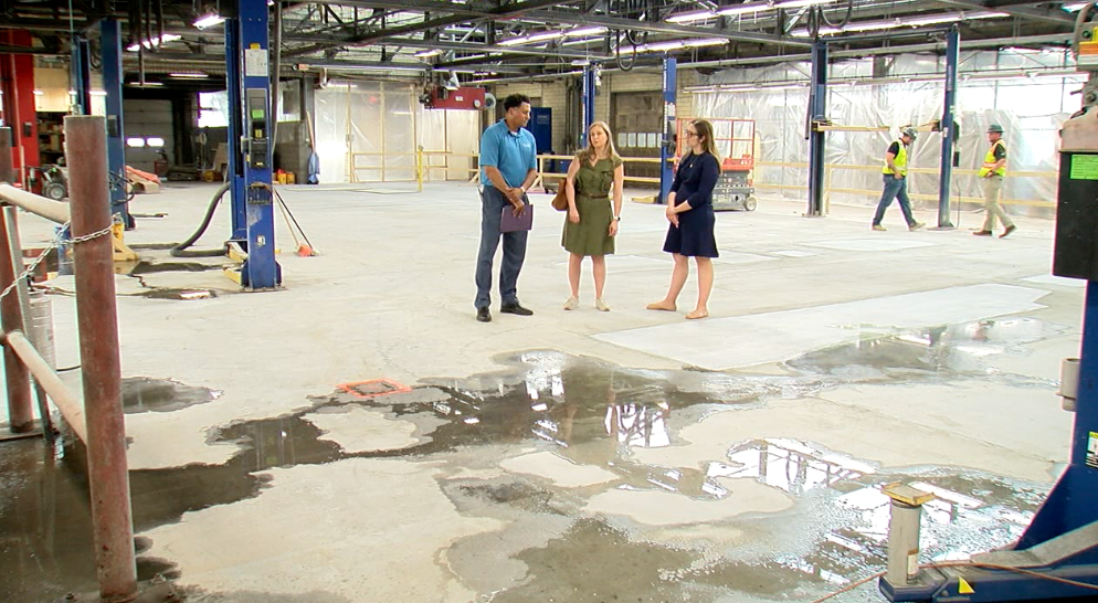 WCPO reporter Paula Christian tours the city of Cincinnati fleet garage with Department of Public Services Director Jerry Wilkerson and Assistant City Manager Virginia Tallent on May 12, 2023.