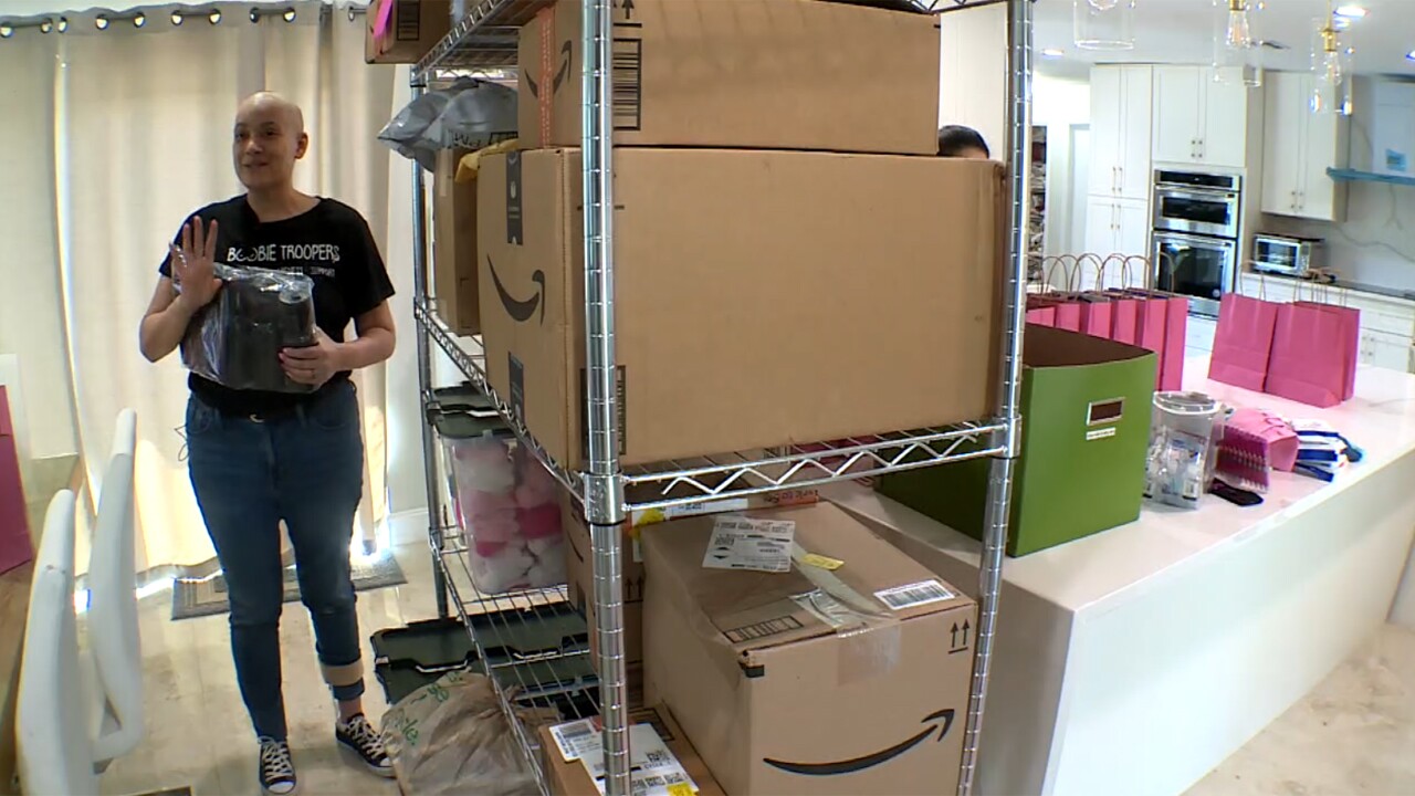 Mariela Contreras packing care packages.