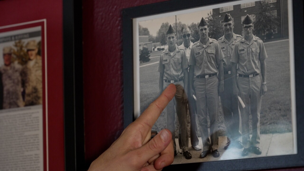 molly points at photo.jpg