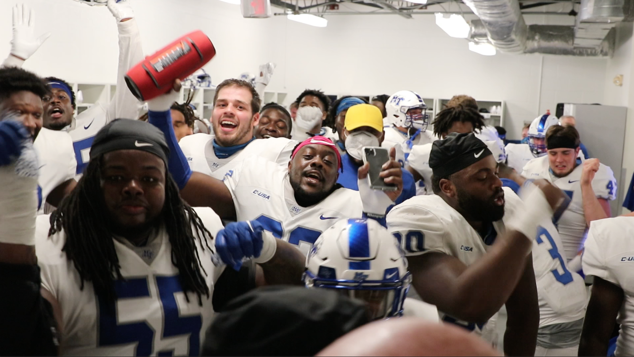 Unmasked MTSU locker room celebration.png