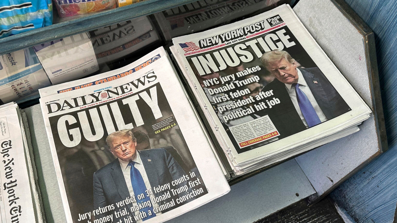 Newspapers are on display at a bodega in the Brooklyn borough of New York a day after a New York jury found former President Donald Trump guilty of 34 felony charges.