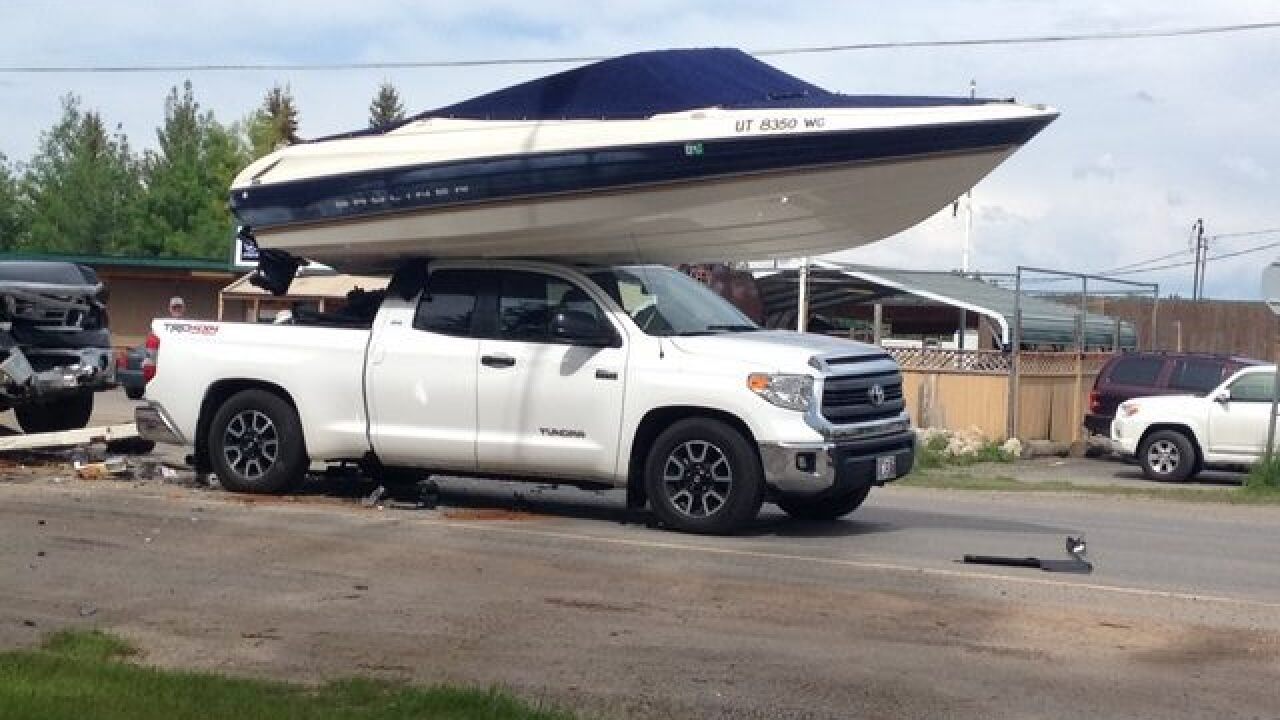 Truck Crashes Into Trailer Sending Boat Onto Roof Of Vehicle