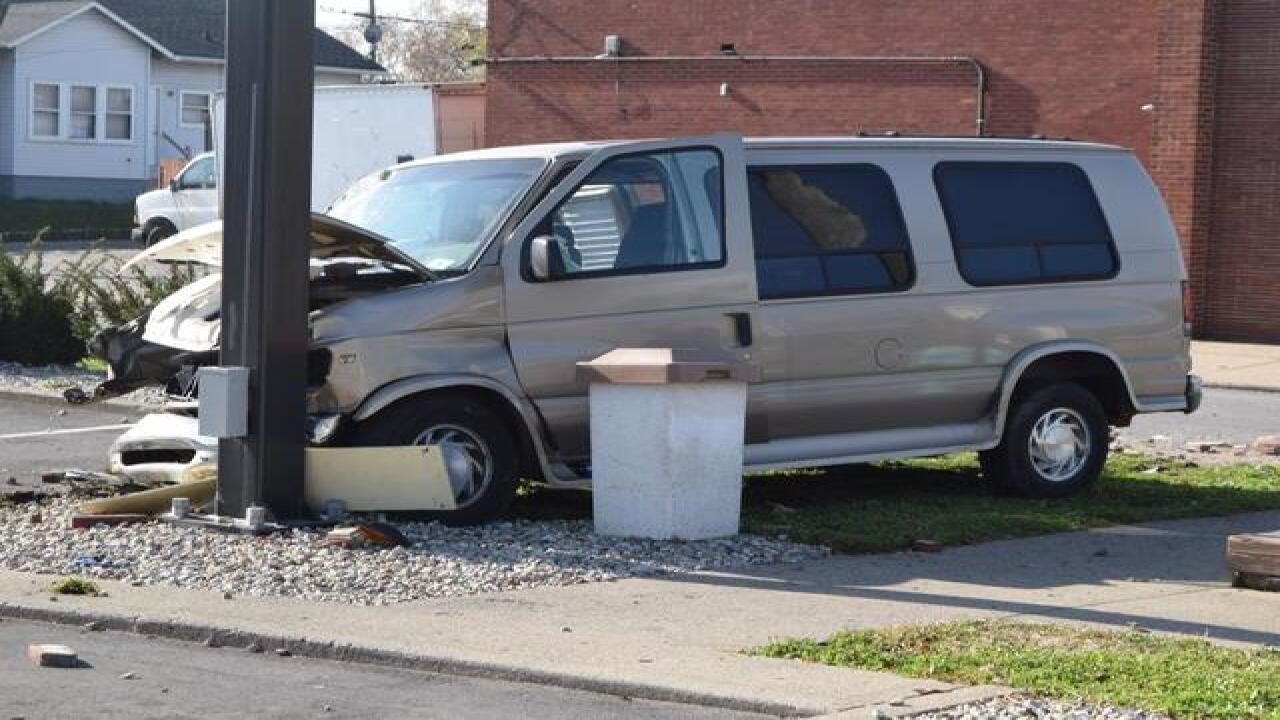 PHOTOS: Van plows into furniture store