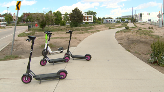 Vigilante scratching out QR codes on illegally parked scooters around Denver
