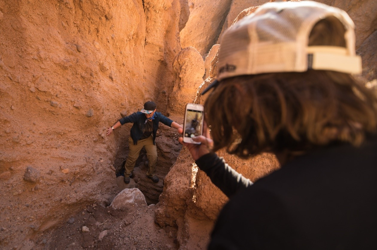 Hiker in Sidewinder Canyon in Death Valley National Park by Kurt Moses.