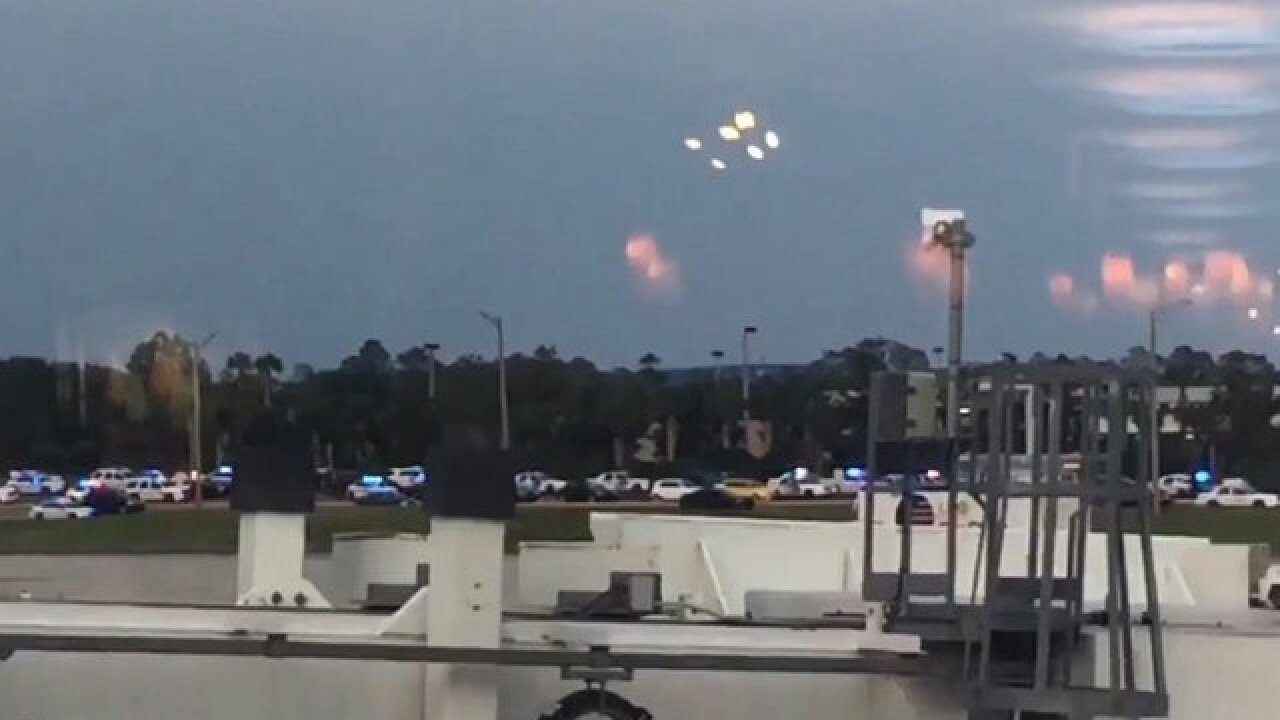 Man with gun at Orlando airport taken into custody after standoff