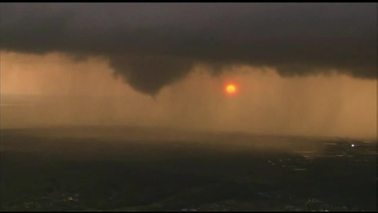 PHOTOS: Tornado forms, touches down