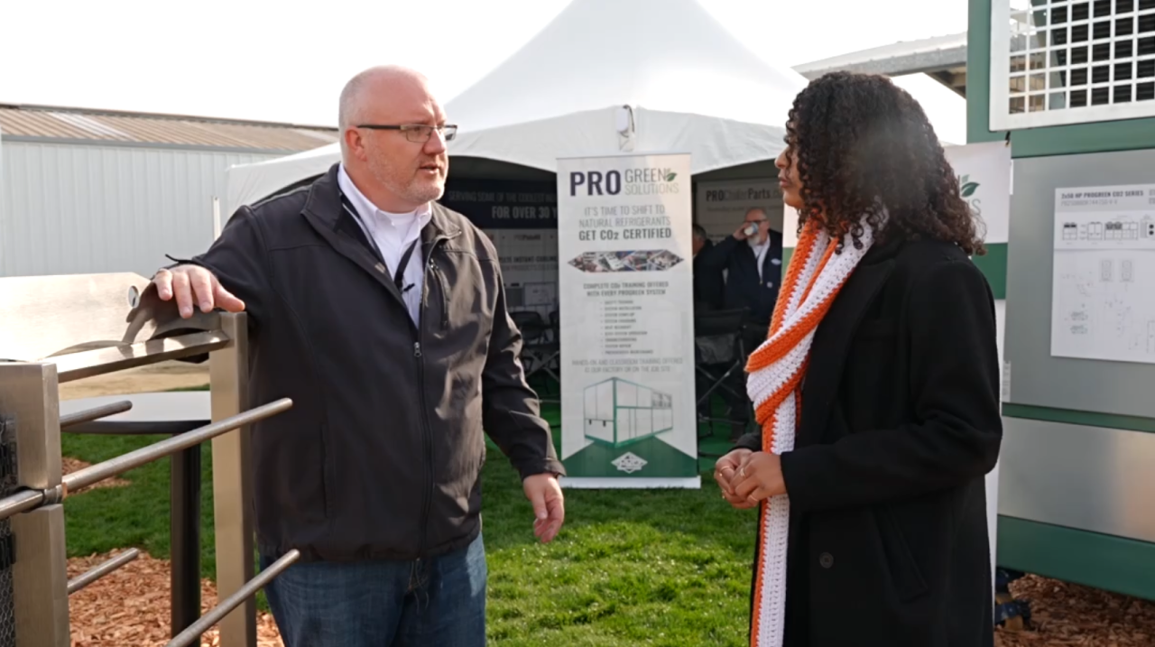 Neighborhood News Repoter Dominique Lavigne interviewing Damon Reed with Pro Refrigeration at the AG Expo