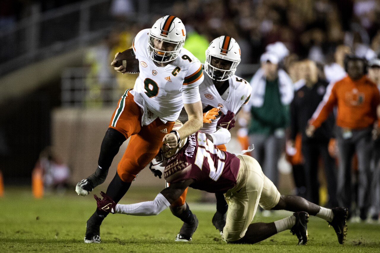 Miami Hurricanes QB Tyler Van Dyke scrambles at Florida State Seminoles, Nov. 13, 2021
