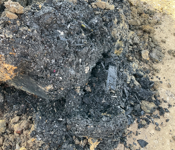 Black waste dug up by excavators on Nov. 9 and 10 at Evan's Broadwell Road facility.