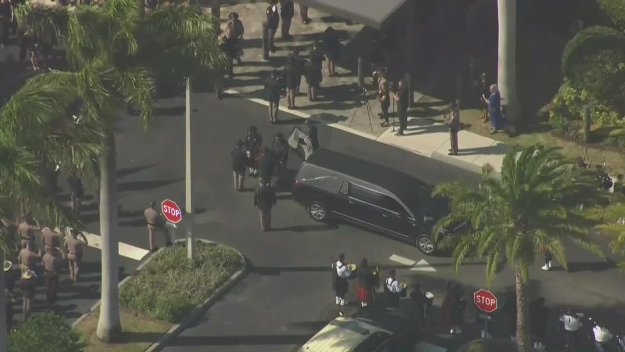 Trooper Zachary Fink's casket removed from hearse after funeral procession arrives at church, Feb. 12, 2024