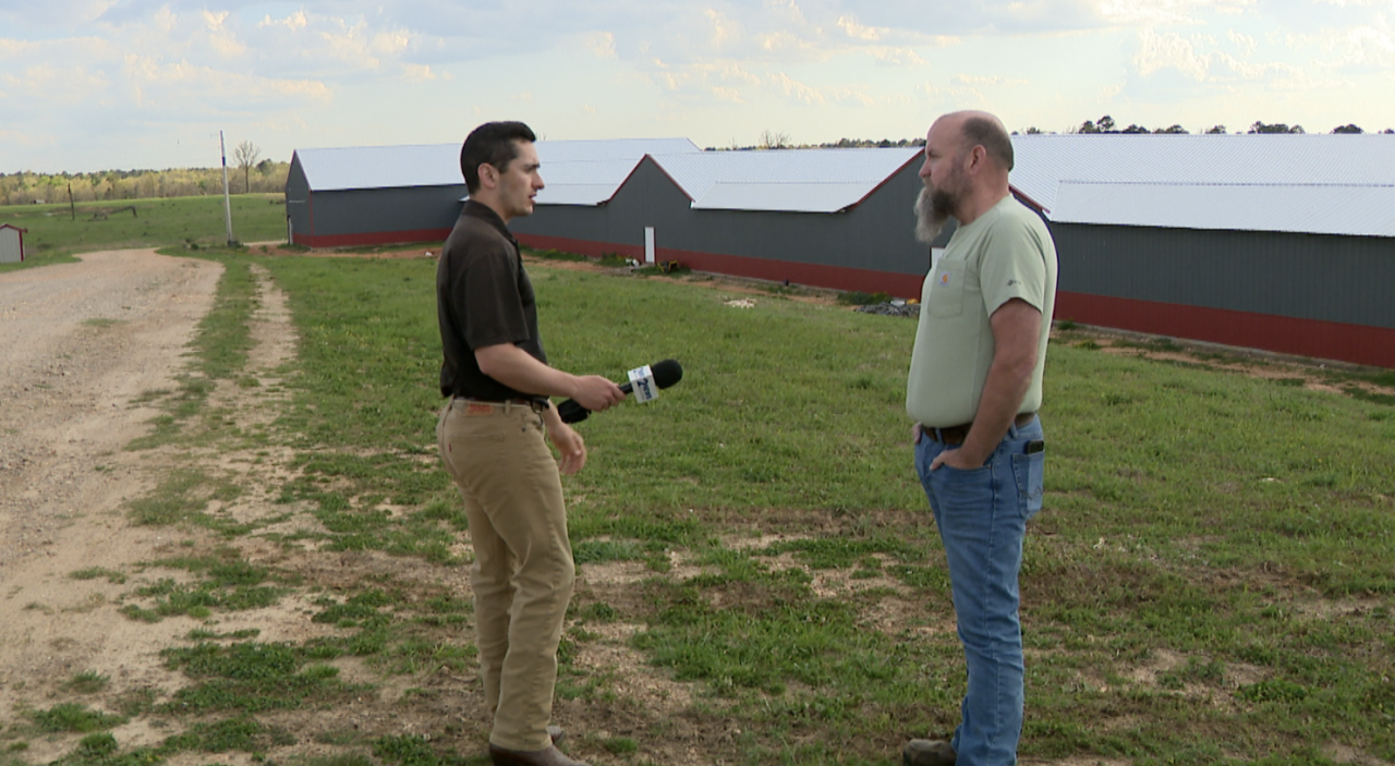 2 News reporter Samson Tamijani with Shawn Clark.png