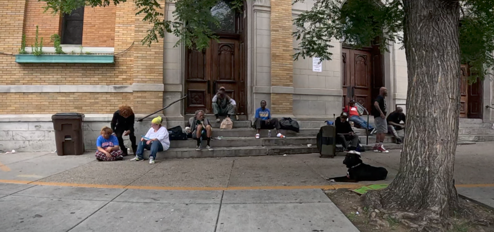 Crowds regularly gather outside St. Francis Seraph Catholic Church in Over-the-Rhine, where fencing is being considered