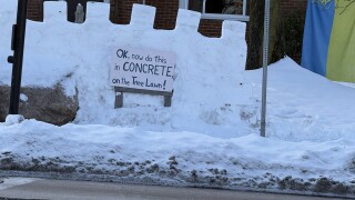 Man builds snow guardrail in front of his Cleveland Heights home