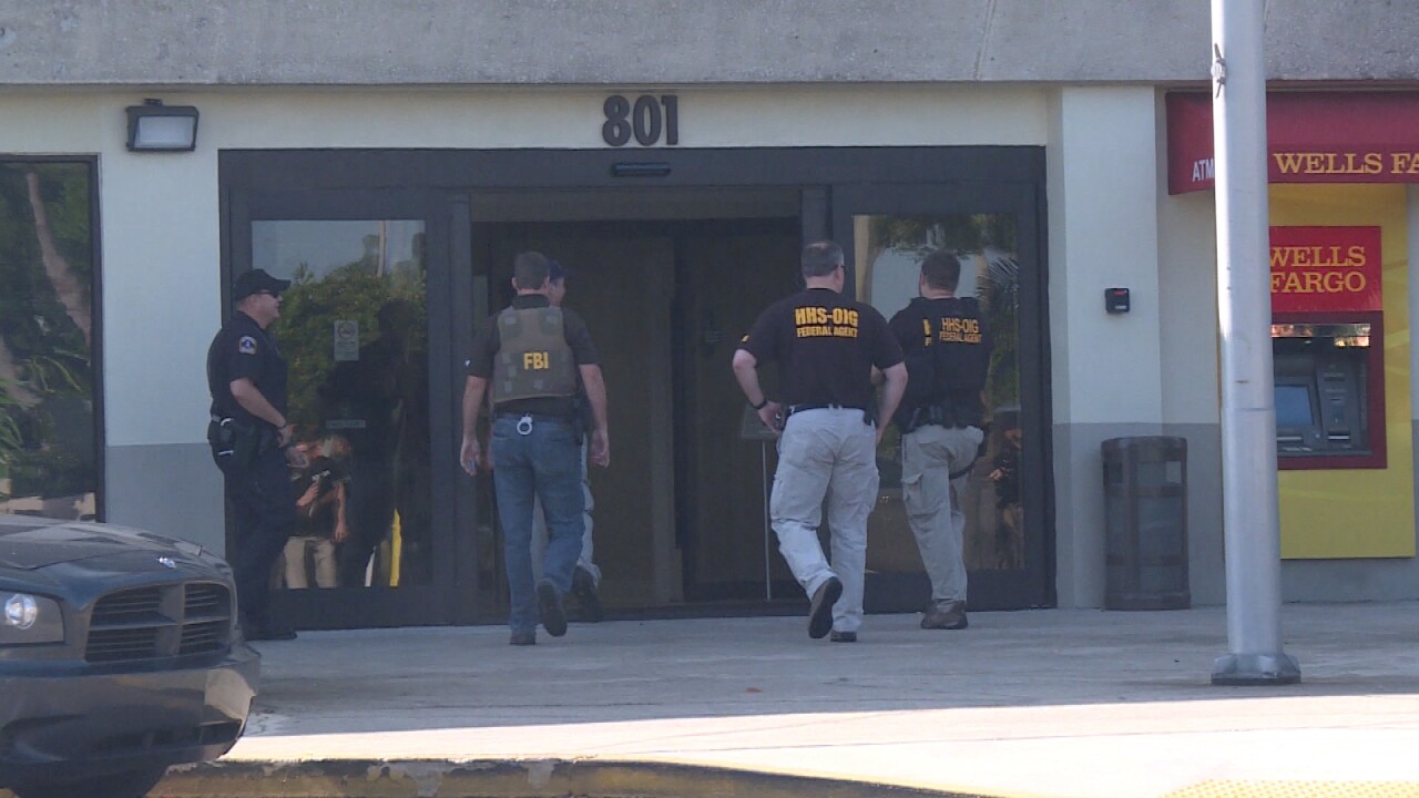Federal agents execute a search warrant at 801 W. Bay in Largo