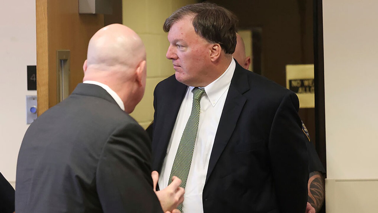 Rex Heuermann, right, appears in Suffolk County Supreme Court with his attorney, Michael Brown.