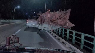 Canoe tips over Mackinac Bridge