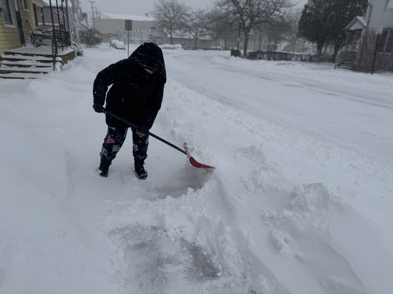 Tessa shoveling 