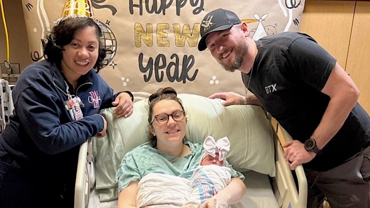 Reneé Babin and Brandon Babin with Parker Marie Babin