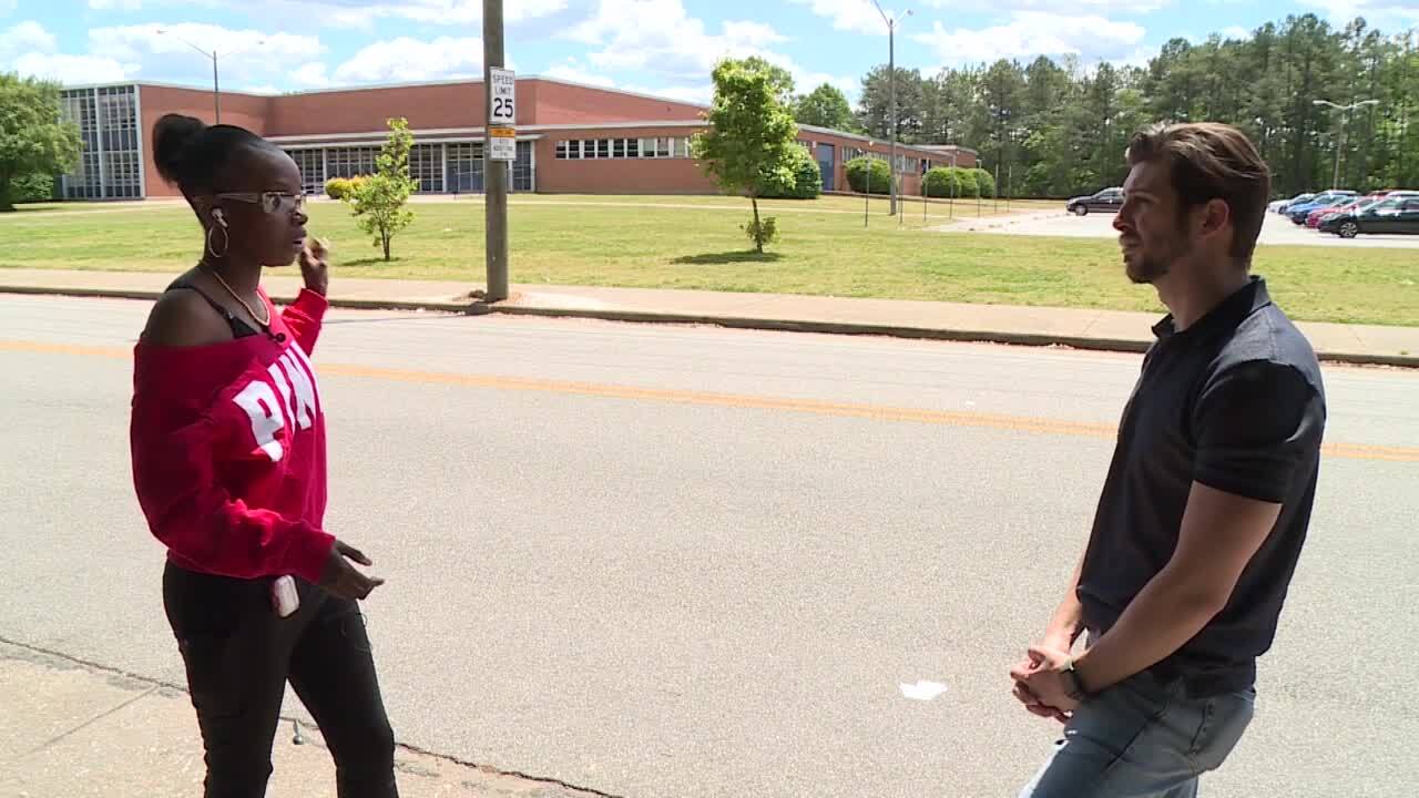 Tisha Erby, an RPS parent whose children will be attending Wythe next year, and reporter Tyler Layne.
