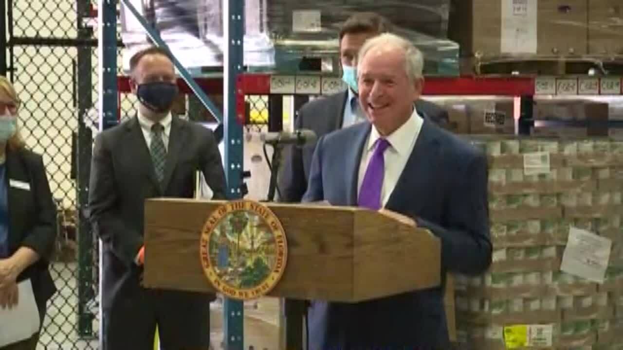Stephen Schwarzman smiles at Palm Beach County Food Bank news conference, April 22, 2021