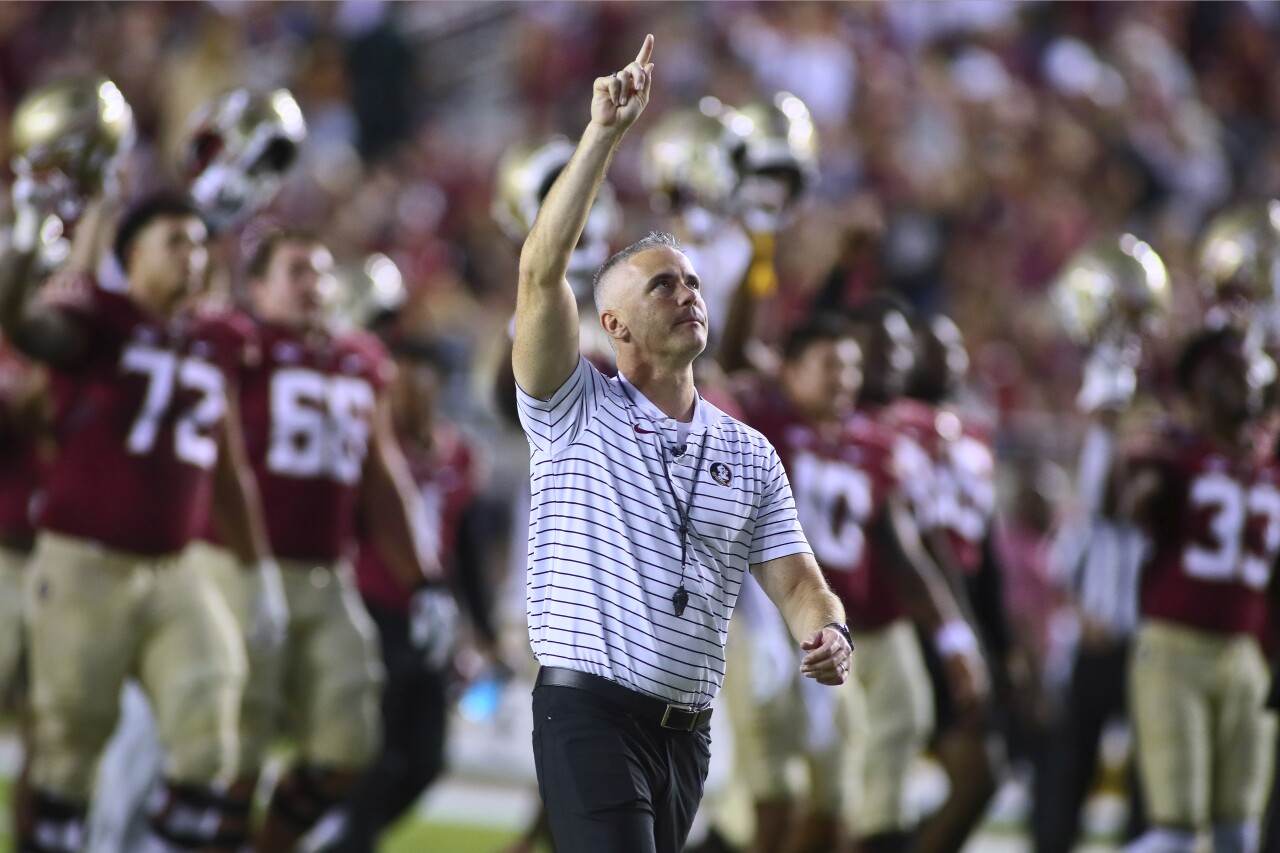 Florida State Seminoles head coach Mike Norvell points to sky before game against Clemson Tigers, Oct. 15, 2022