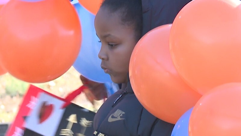 Child at violence vigil.jpg