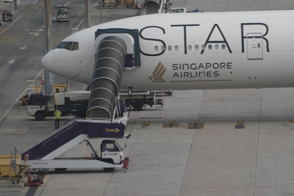 The aircraft of Singapore Airlines flight SQ321 is parked at Suvarnabhumi International Airport, near Bangkok, Thailand, after the London-Singapore flight encountered severe turbulence.