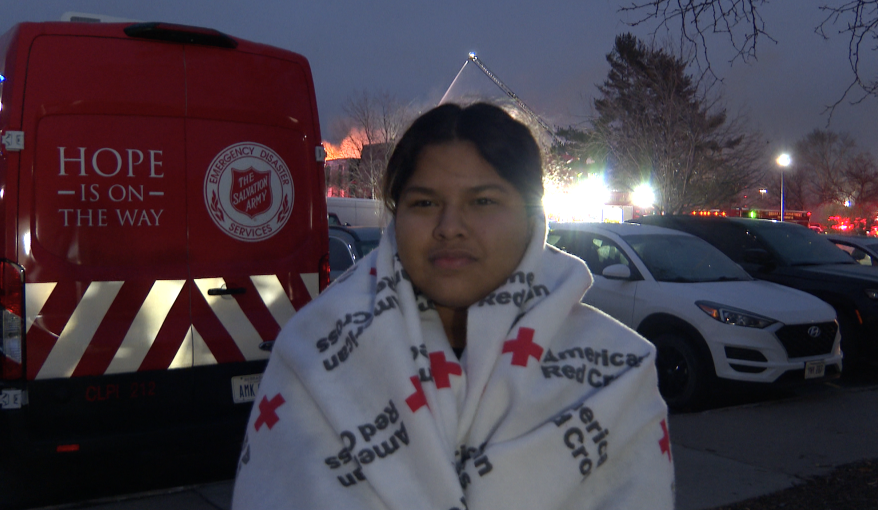 Lizzy Martines warms-up in Red Cross blanket