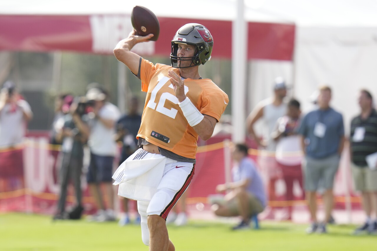 Tampa Bay Buccaneers QB Tom Brady throws during practice, Aug. 10, 2022