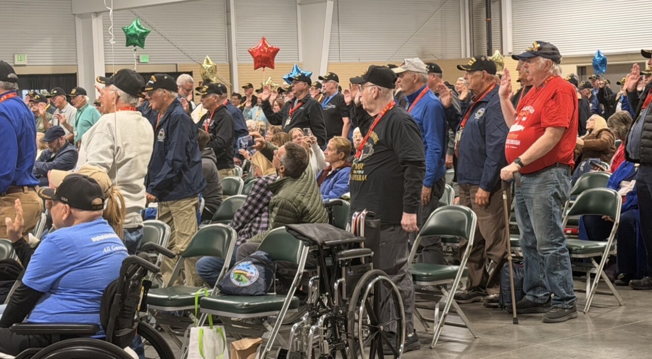 Veterans taking part in a ceremony before heading to the airport. 