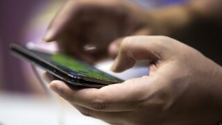 Person holding smartphone