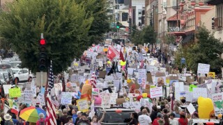 'No Kings' protesters marching