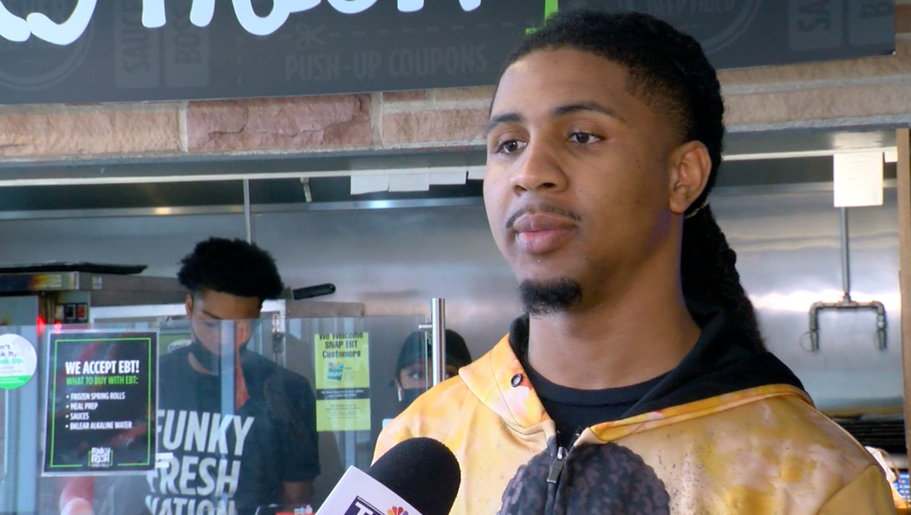 Donyan Robinson works in office.png