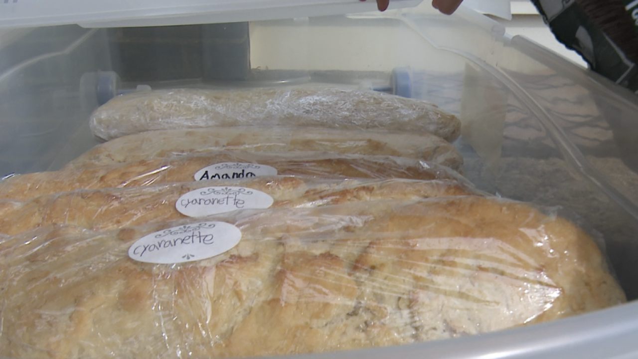 8yearold girl baking bread to give away as groceries struggle to keep