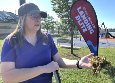 Kelly Goward holding an AIS