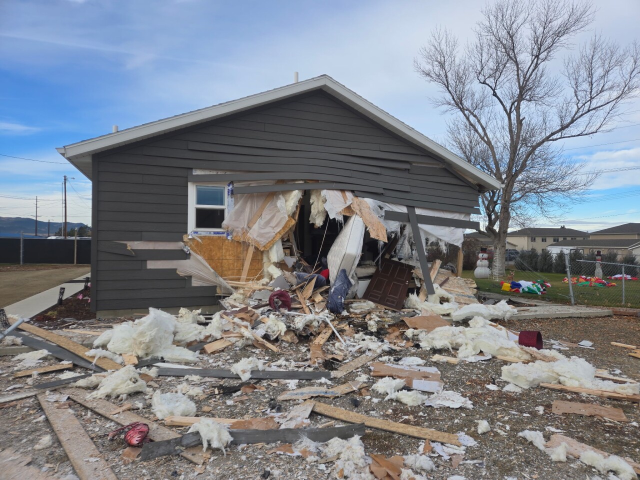 Woman killed after car pursued by MHP crashes into house