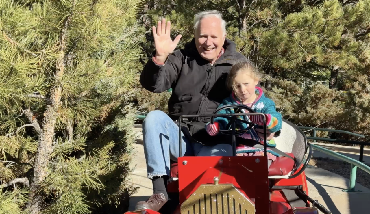 Bob McAdams driving to the North Pole with his granddaughter