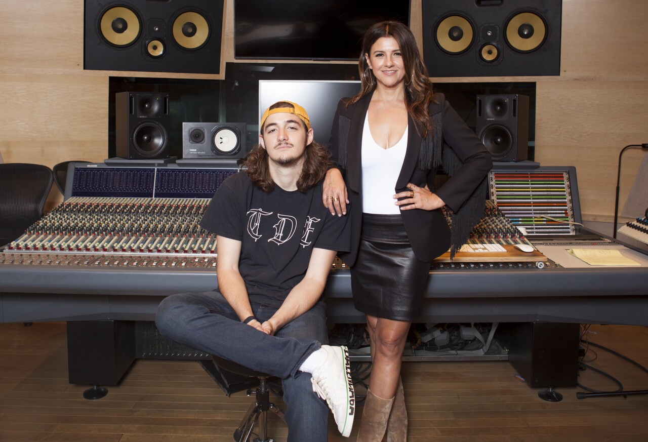 Deacon Frey and Glenn Frey's widow Cindy Frey pose in 2018