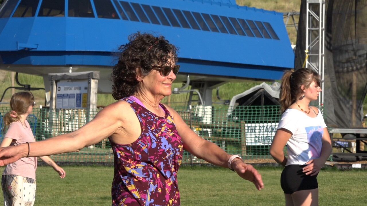 Liz Fitzgerald participates in the yoga class on Thursday evening