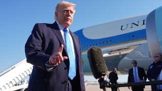 President Donald Trump speaks with the media before boarding Air Force One, Monday, March 23, 2026, at Palm Beach International Airport in West Palm Beach, Fla.