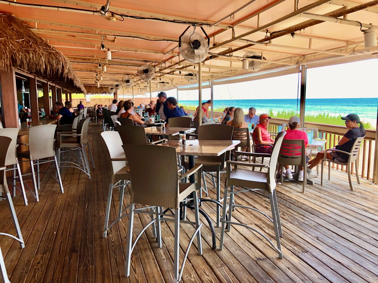 Shuckers on the Beach has dining available inside and outside with an ocean view.