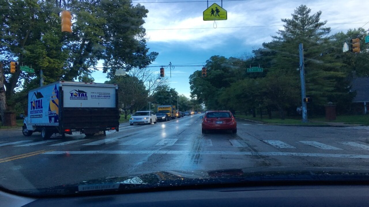 PHOTOS: Ominous clouds, downed trees, flooding