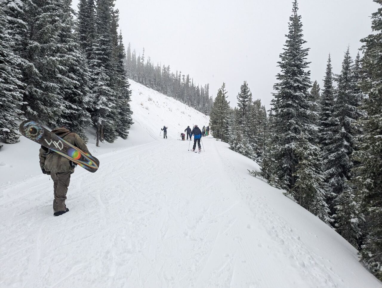 Snowbowl riders hike