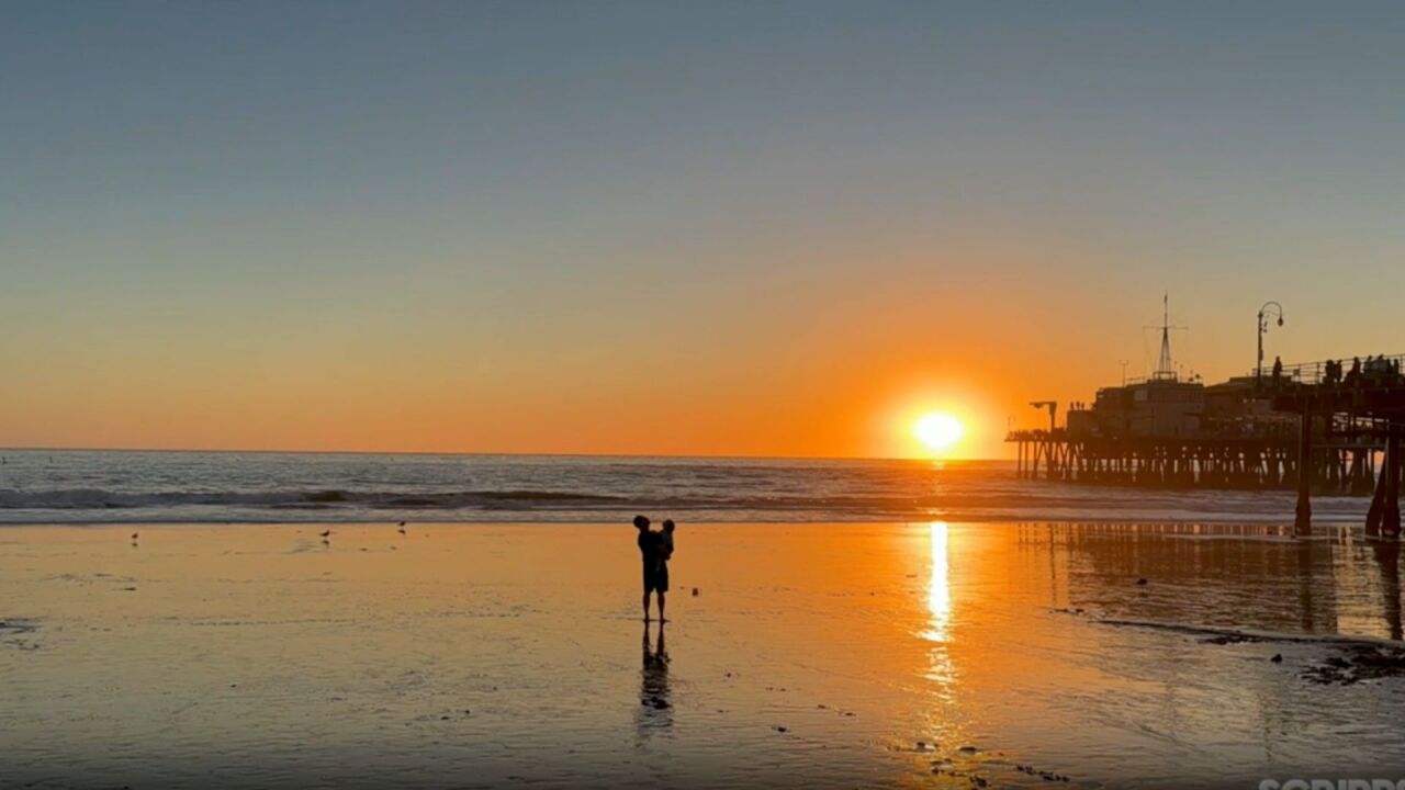 The sun is seen setting off the coast of California.